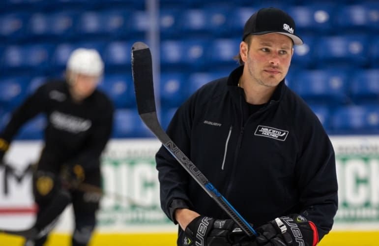 NAR Hockey coach running an on-ice session